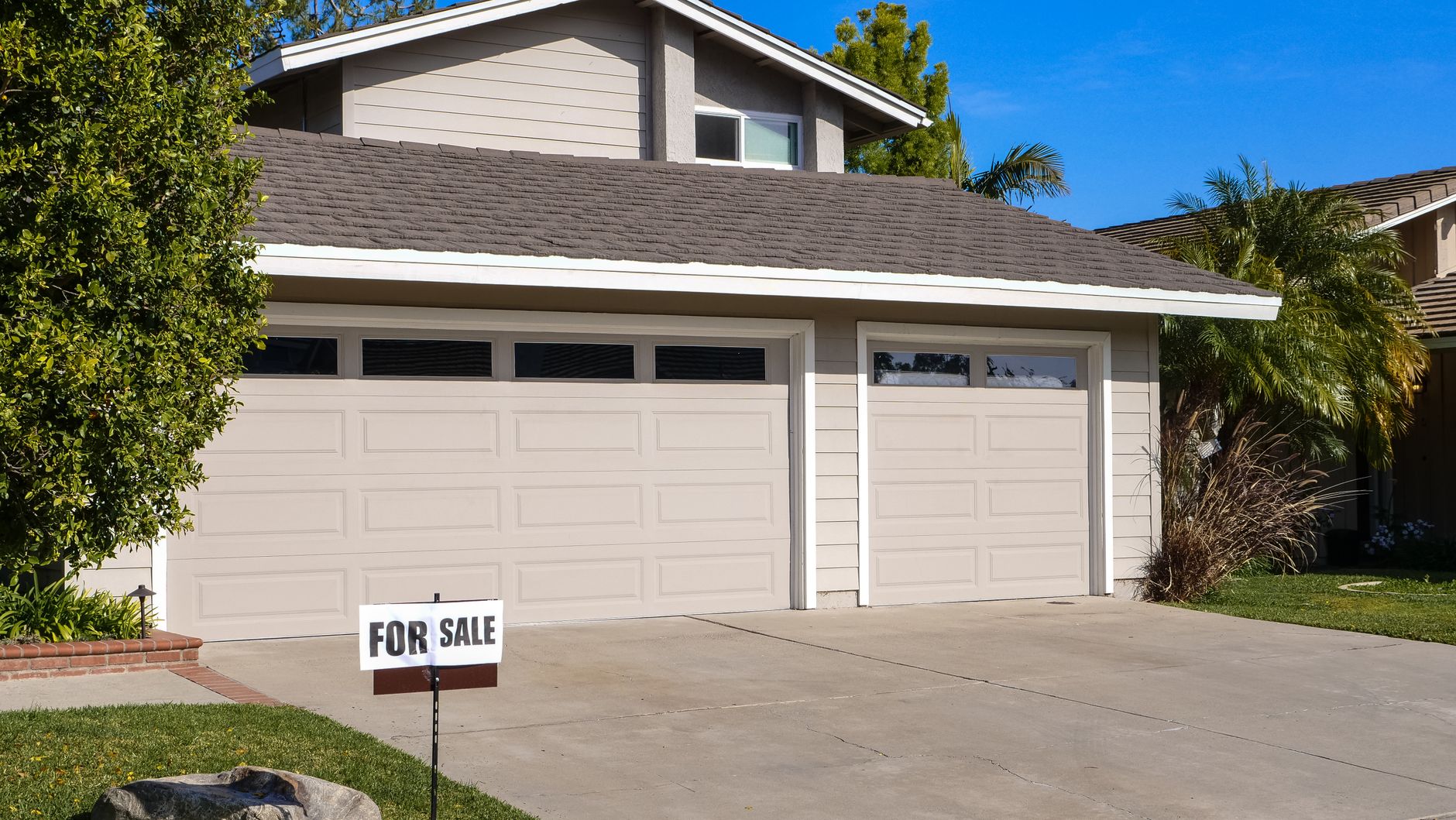 7 Foot vs 8 Foot Garage Door: Which One Actually Fits Your Home (and Your Truck)? 4 Two-car garage on residential home