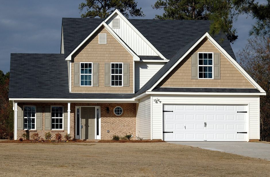 Elegant two-storey house with garage showing Chamberlain opener installation context