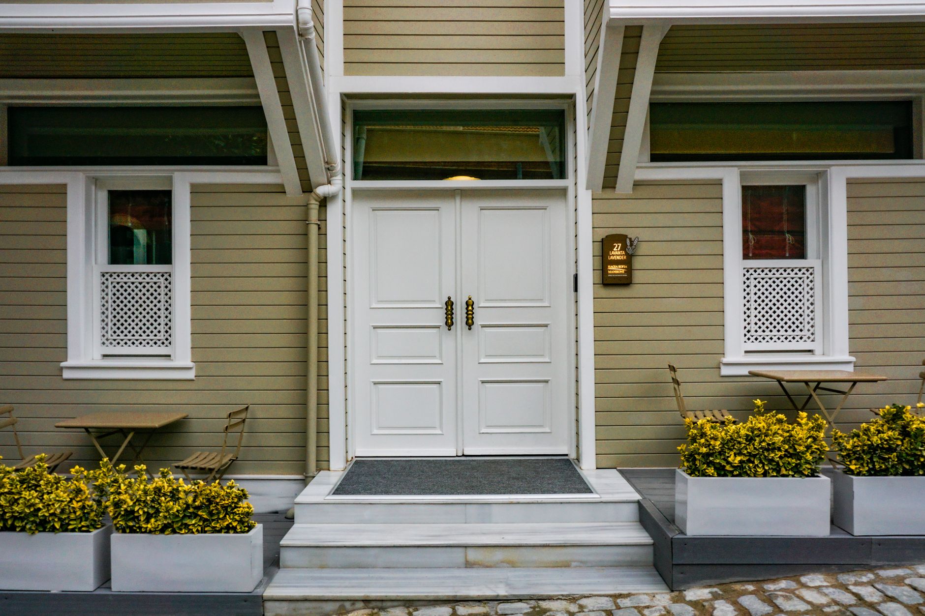 5 Best Solutions for Garage Door Leaking Corners 6 Garage door threshold seal being installed on floor