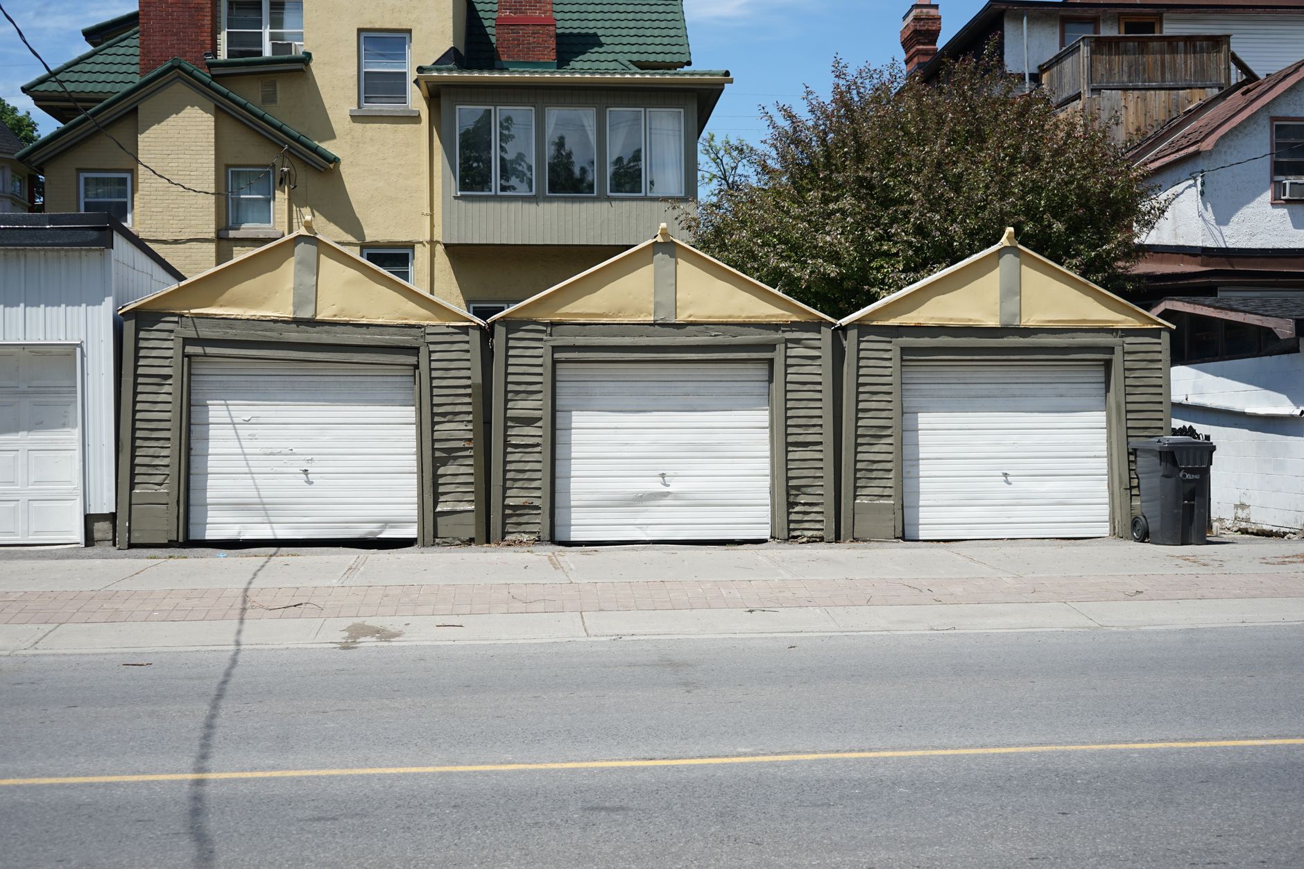 Garage door shifted to one side showing imbalance
