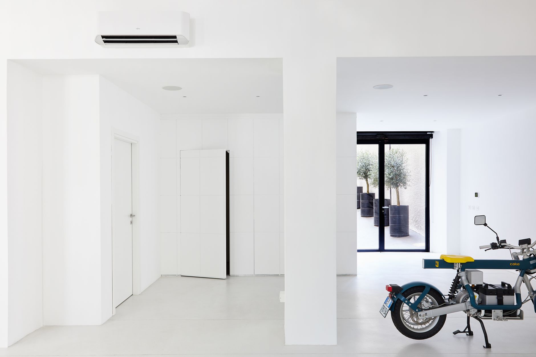 Garage door opener motor unit mounted on garage ceiling
