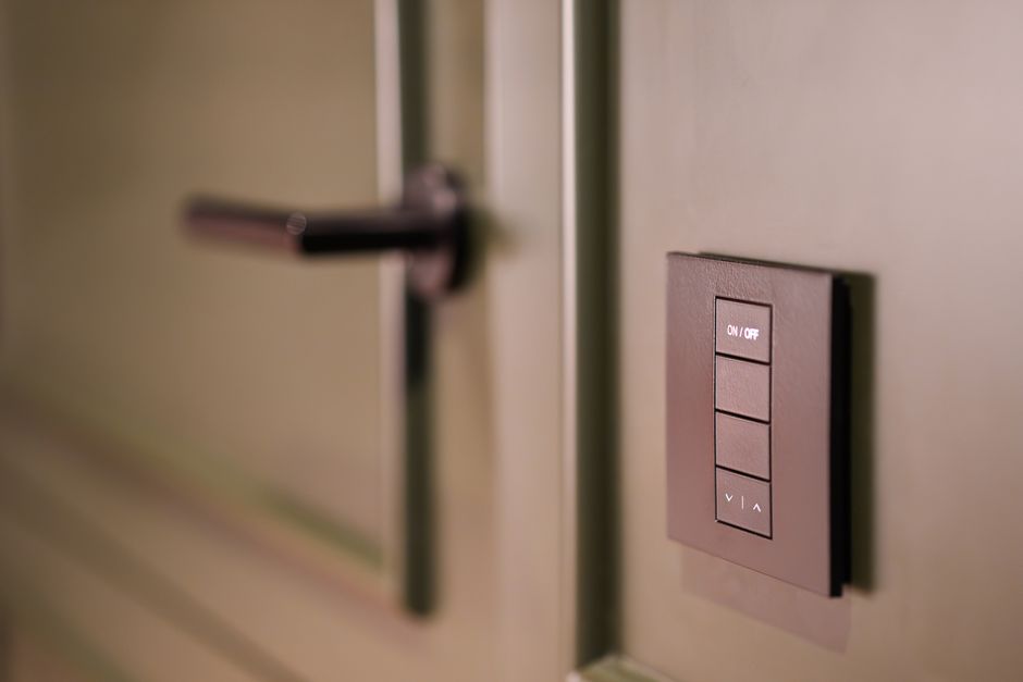 How to Add a Second Garage Door Opener to MyQ 3 Smart home wall switch representing MyQ hub installation