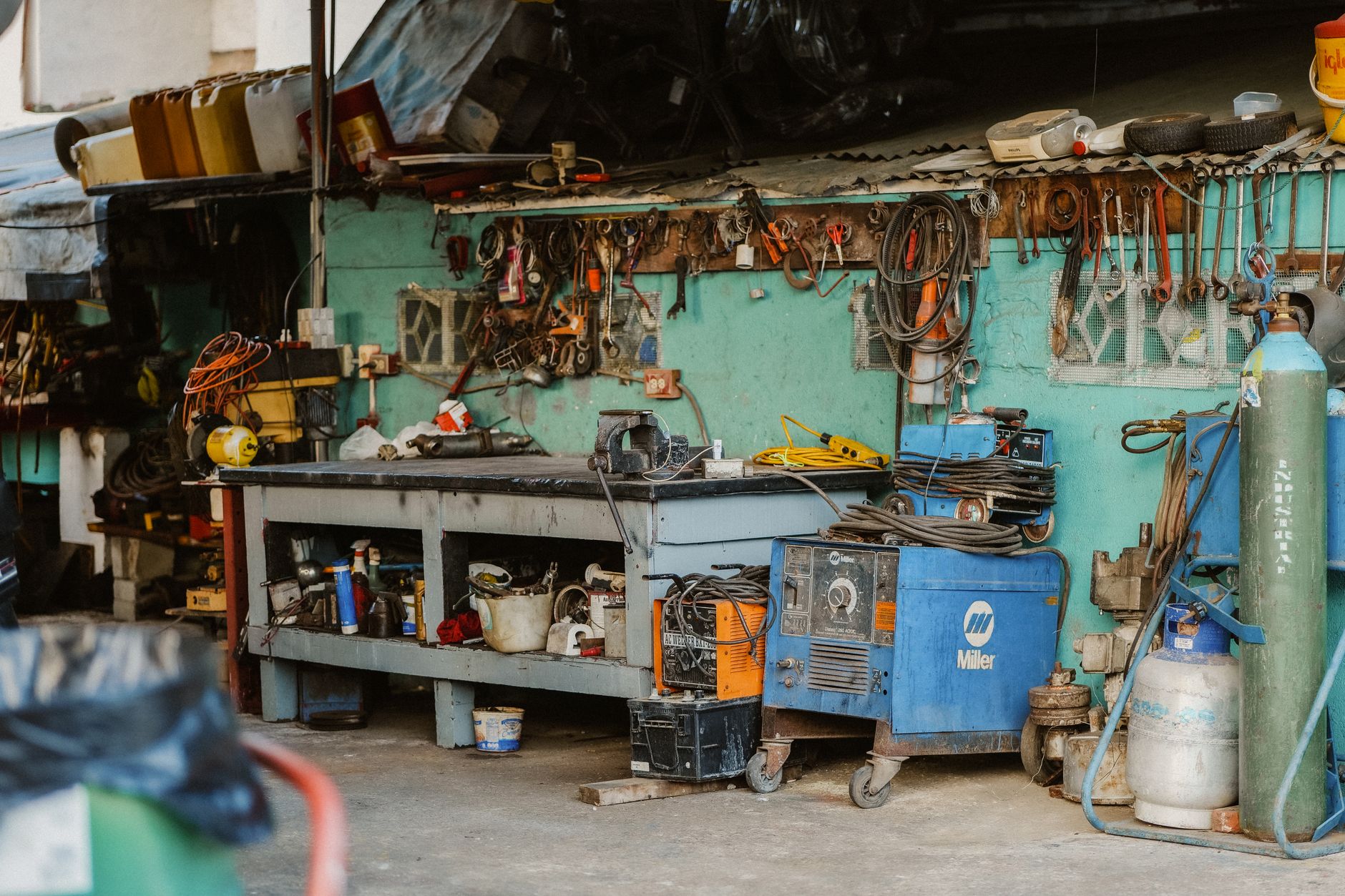 Ryobi Garage Door Opener Troubleshooting: Fix Every Problem Fast 2 Ryobi brand products in a garage workshop