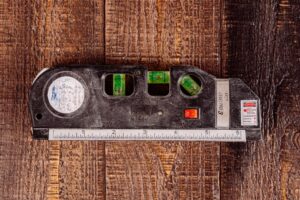 Read more about the article Carpenters Blocks Garage Door: How to Shim a Frame Right