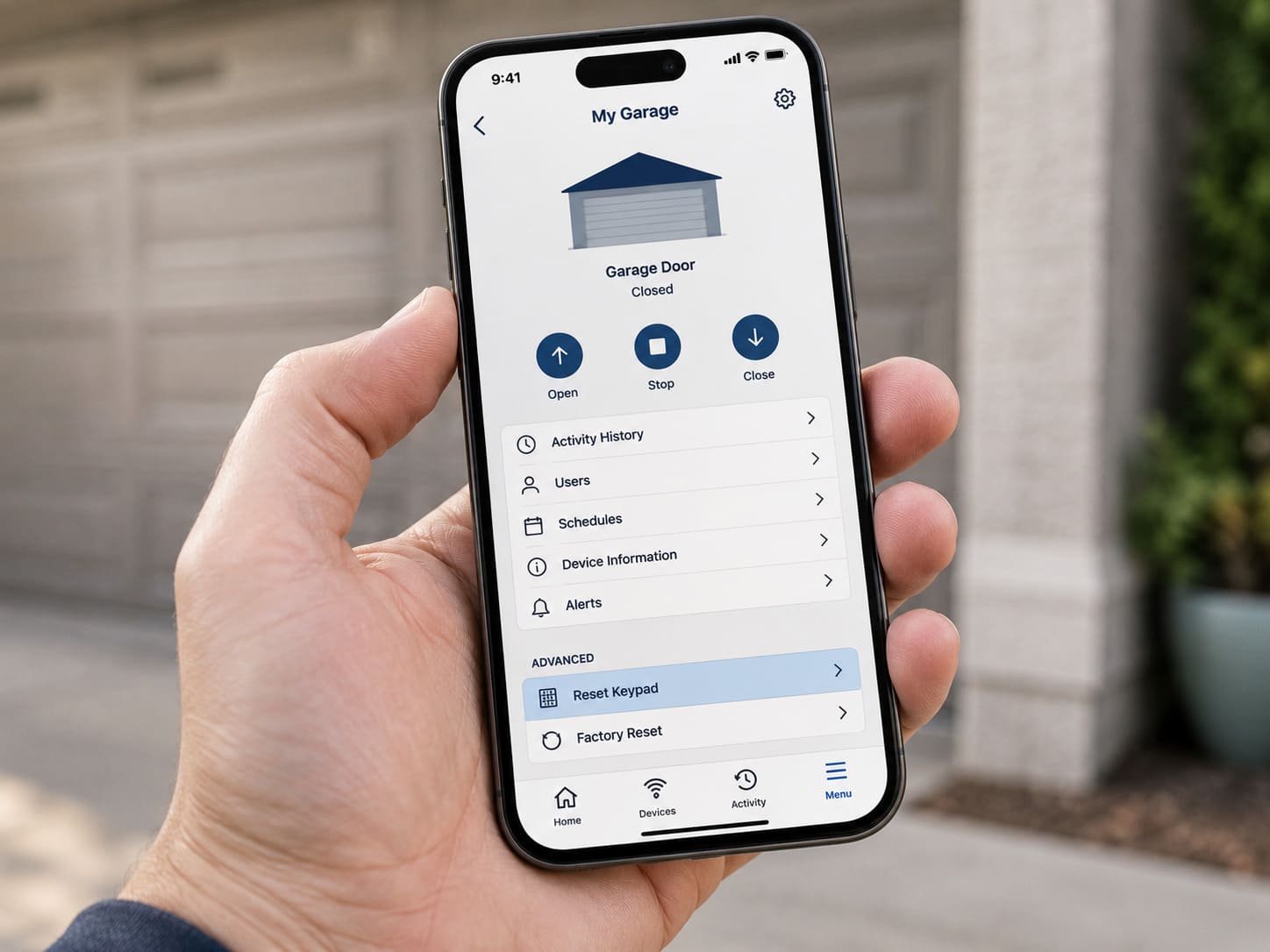 Smartphone showing myQ app settings screen with Reset Keypad option