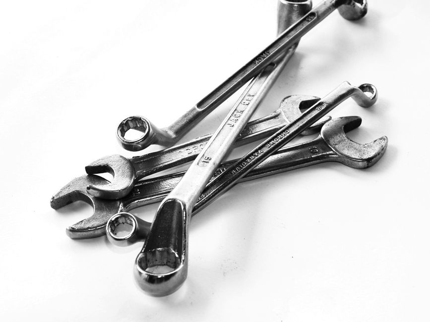 Best Nylon Garage Door Rollers (2026 Picks) 5 Steel wrenches representing budget-friendly roller replacement tools