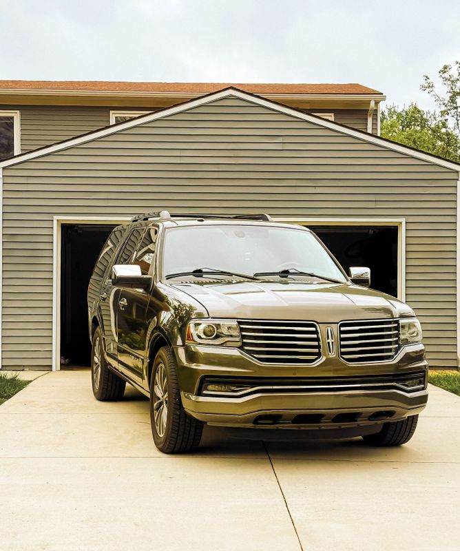 Residential garage door exterior where opener brand compatibility matters
