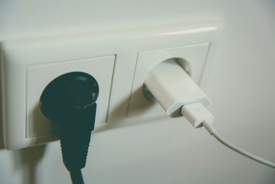 Genie Garage Door Opener Amp Draw: Full Circuit Guide 8 Wall outlet with electrical plugs inserted