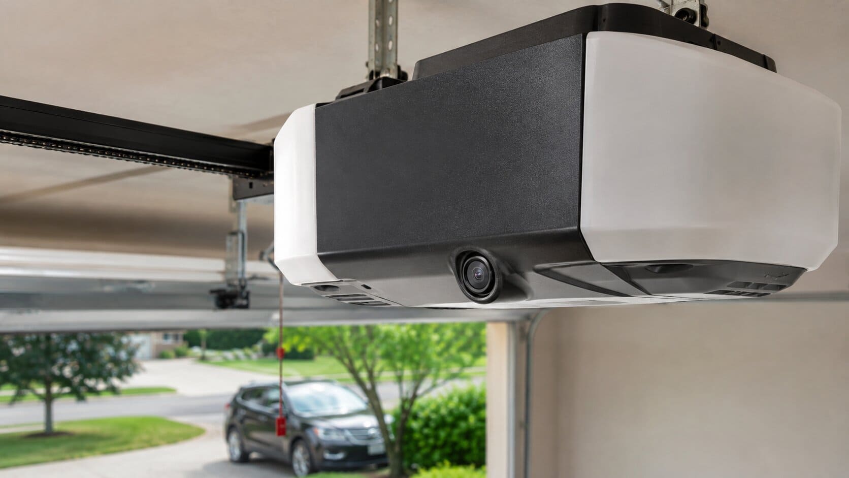 Best Chamberlain Garage Door Opener in 2026 (By Model) 4 Chamberlain B970 belt drive garage door opener installed on ceiling rail