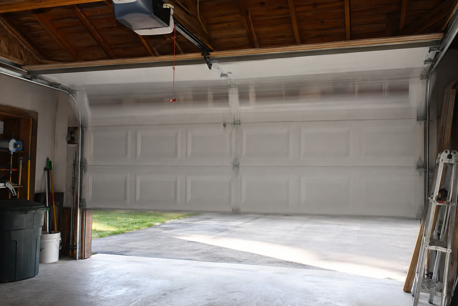 Genie garage door stopped partway down and reversing due to a close limit switch set too far