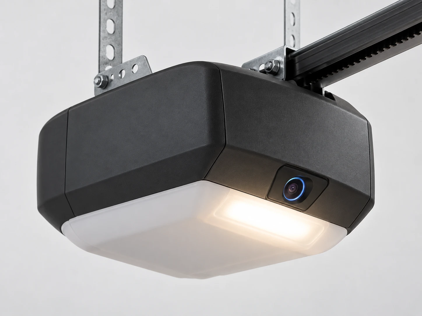 Best Garage Door Opener With Camera (2026 Picks) 2 Premium garage door opener motor unit with an integrated camera lens and LED work light, studio product shot